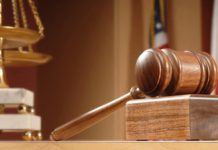 Người đại diện của người bị kiện là cơ quan, tổ chức